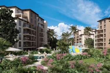 Exterior of modern tropical resort condo complex with pools, playground, balconies at Costa Chame Panama
