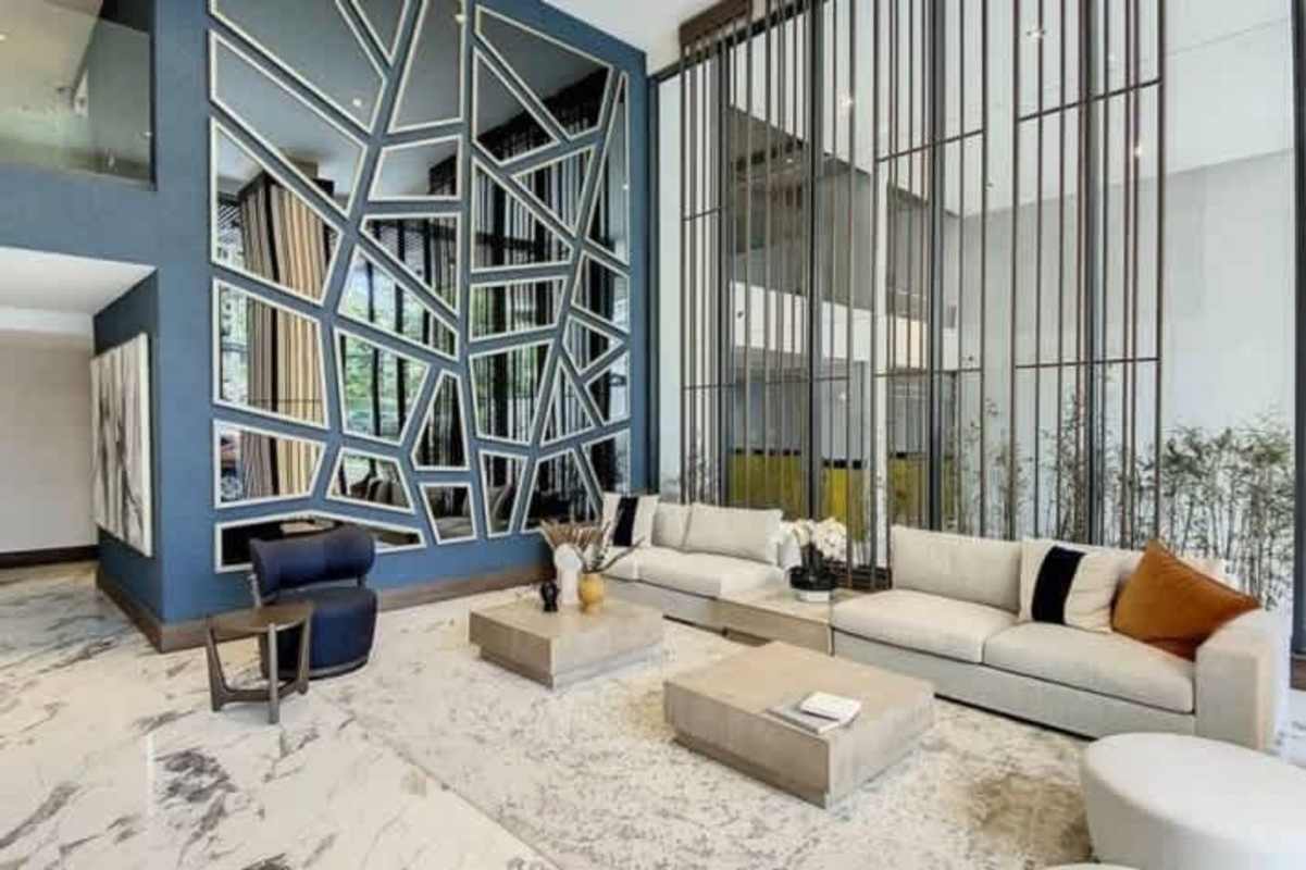 Swimming pool deck with lounge chairs, vertical garden, luxury high-rise in Bella Vista Panama