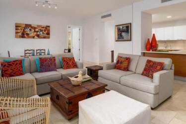 Modern open kitchen with island and appliances in luxury Buenaventura apartment for rent