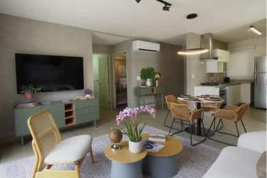 Contemporary open kitchen and living dining room in Costa Chame Panama condo