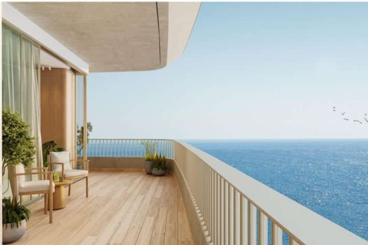 Private balcony with panoramic ocean and skyline view at PH Ipanema Costa del Este Panama