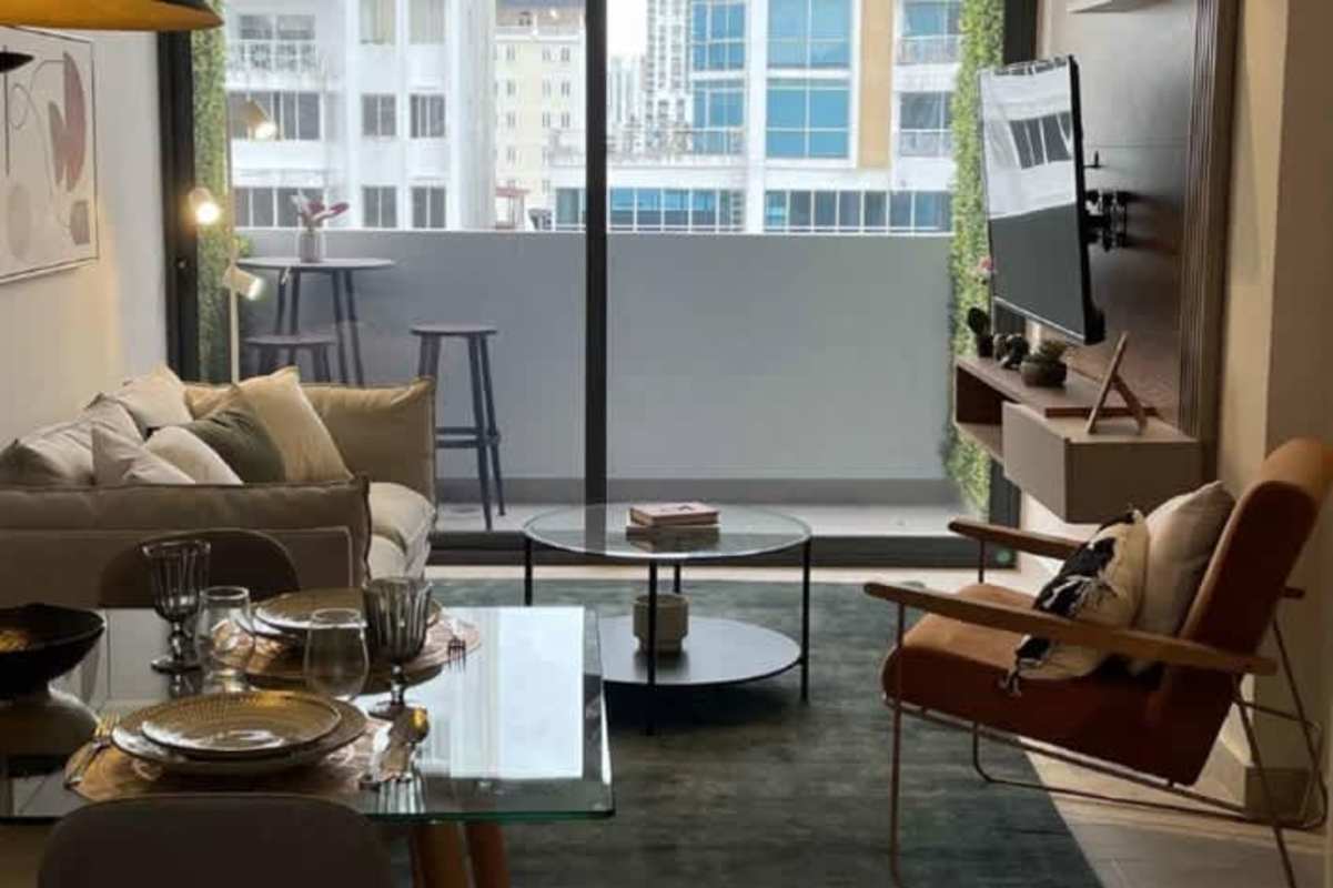 Modern minimalist bedroom with blue accent wall, large window, cityscape view, San Francisco Panama