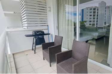 Private condominium balcony with grill seating ocean lagoon view Playa Blanca Panama for sale