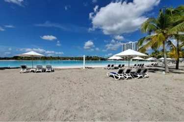 Massive saltwater lagoon pool with beach access at Playa Blanca Resort Rio Hato Panama for sale condo