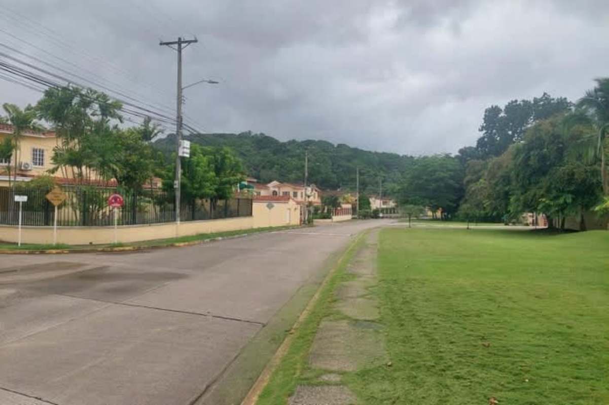 Quiet street green lawns suburban residential Green Valley Albrook Panama City