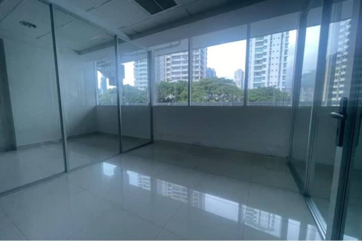 Modern tiled bathroom with vanity inside commercial office PH Office One Tower