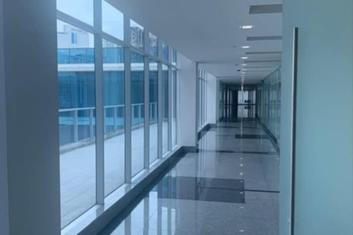 Bright hallway with windows glossy floor commercial business tower PH Century Tower Panama City