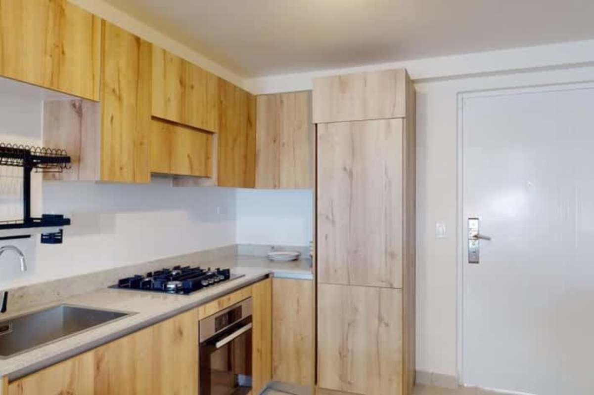 Modern bathroom with walk-in shower and floating vanity PH Bella Vista Residences