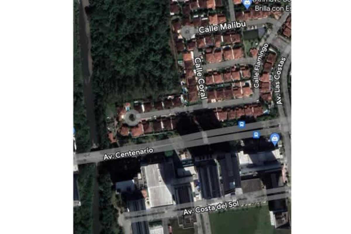 Aerial photograph of Costa del Este upscale neighborhood with road grid and buildings in Panama City