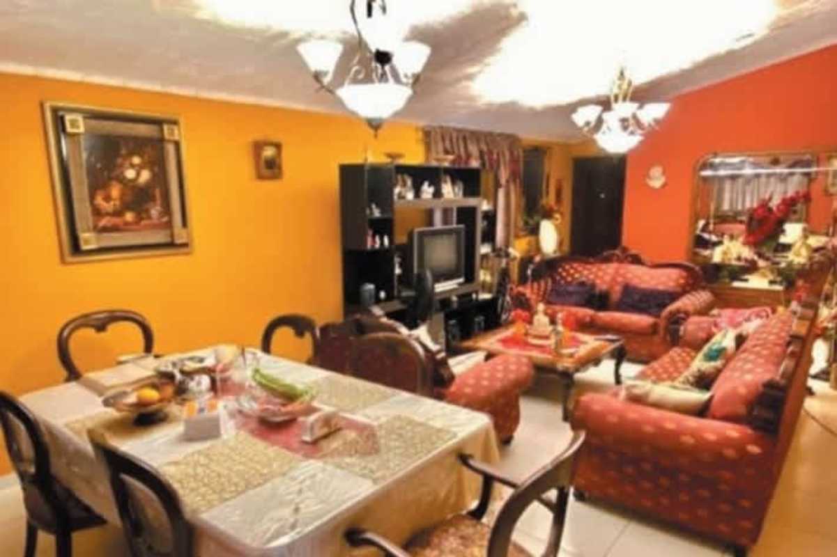 Traditional living and dining room in furnished house for sale Las Cumbres Panama City