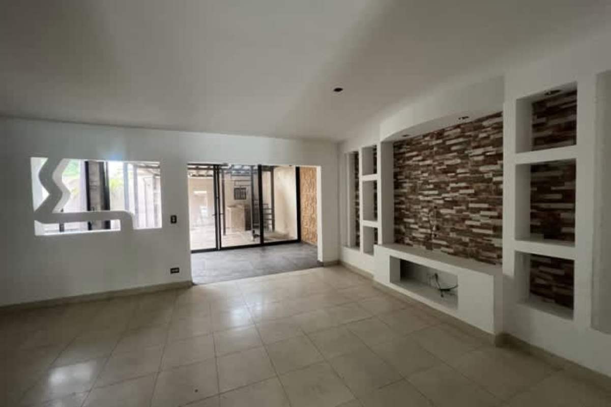 Kitchen space with granite counters and window PH Villa Tiber Brisas del Golf