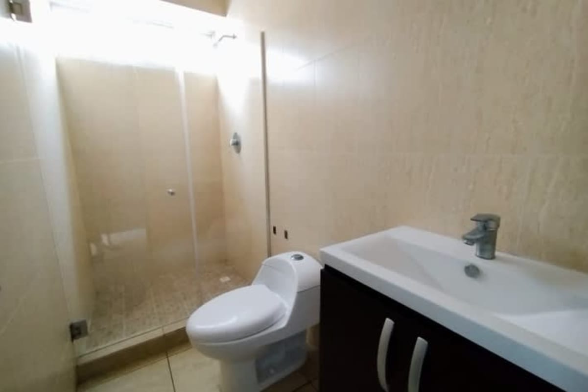 Living dining area with balcony access and large window PH Metropolitan Park Carrasquilla Panama