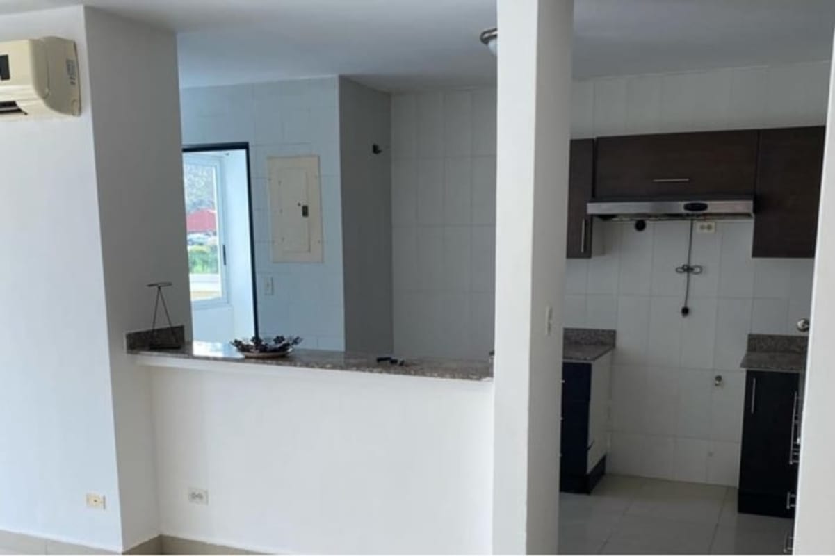 Modern open kitchen with granite counters and cabinetry PH Sun City Albrook Panama