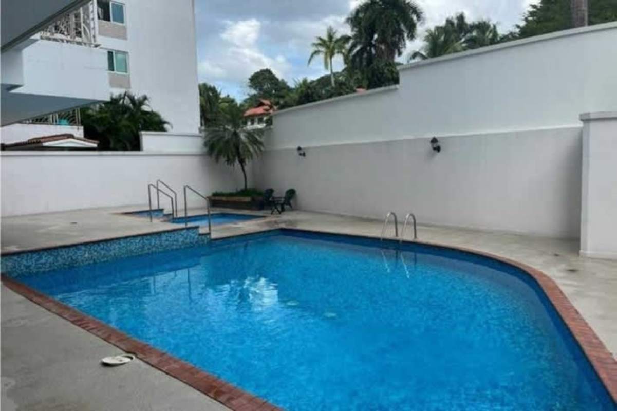 Minimalistic bedroom with blackout blind and built-in storage PH Sun City Panama