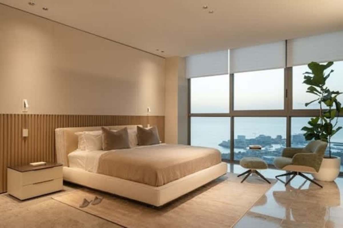 Modern glass high-rise exterior PH Sea Point luxury tower Punta Paitilla Panama City