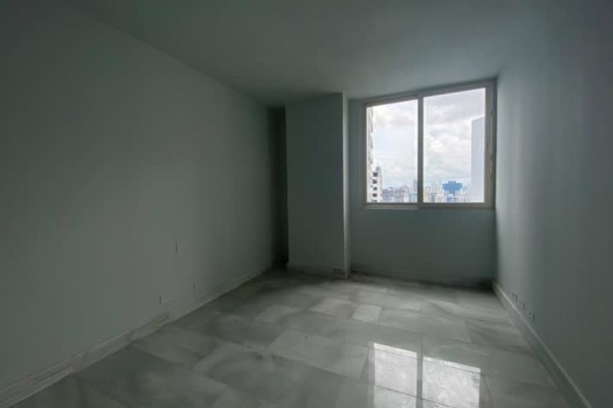 Sky lounge with infinity pool overlooking ocean sunset at The Towers Punta Paitilla Panama