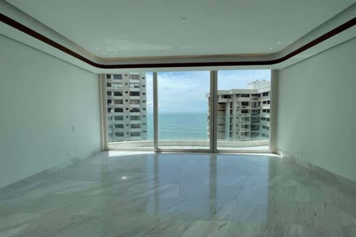 Modern living room with marble floors and panoramic ocean views in The Towers Punta Paitilla Panama