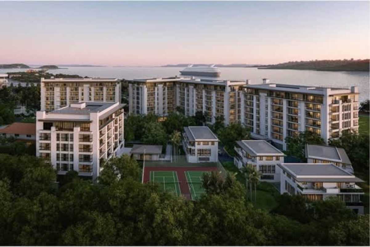 Modern oceanfront condominium complex sunset view at Passage Amador with ships nearby