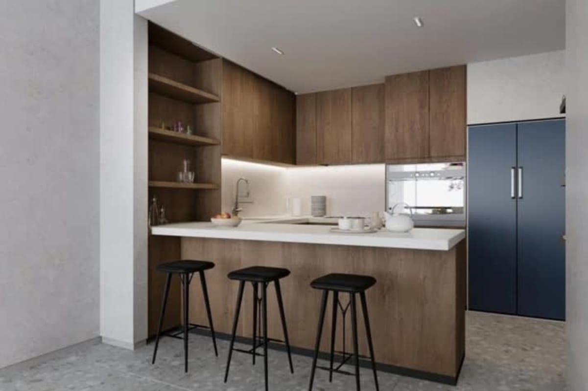 Contemporary kitchen with wood cabinets and large island in Passage Amador Panama luxury condo