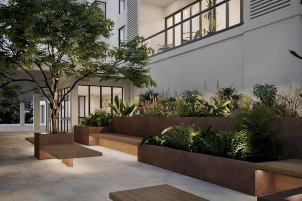 Private courtyard with lush landscaping and modern facade Passage Amador Panama
