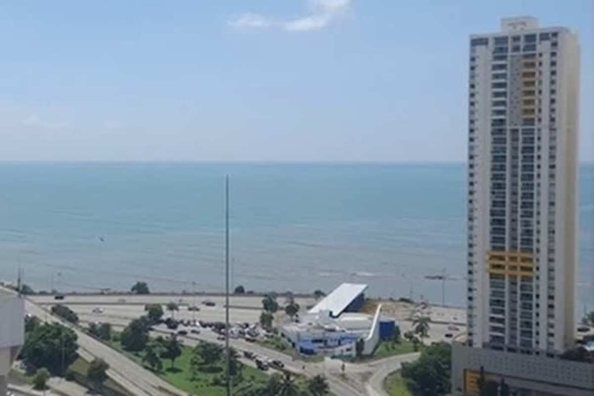 Elegant living and dining room fully furnished with panoramic ocean views in PH Costa Pacifica San Francisco Panama