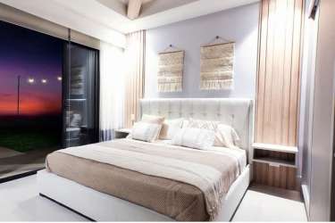 Luxury bathroom with glass shower and double sinks Costa Esmeralda beach house Panama