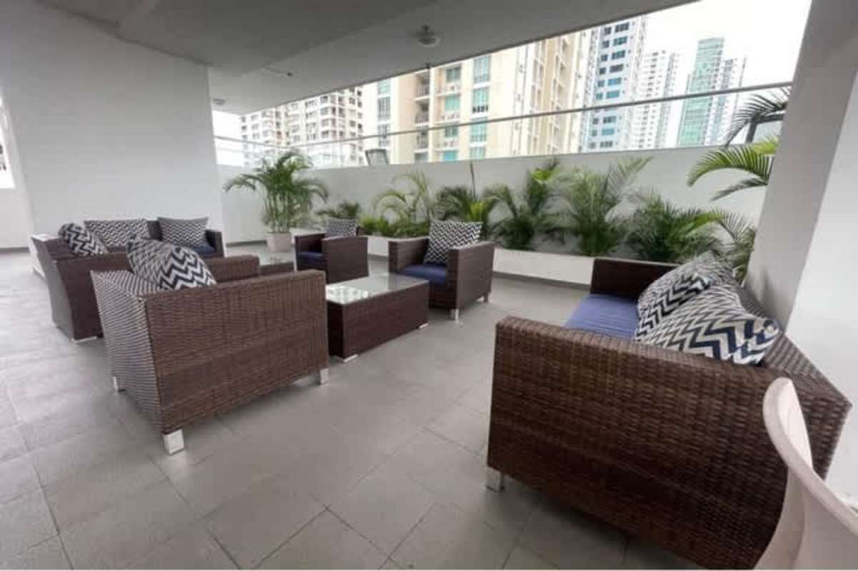 Bright bedroom with floor-to-ceiling window and skyline views in PH San Francisco Bay