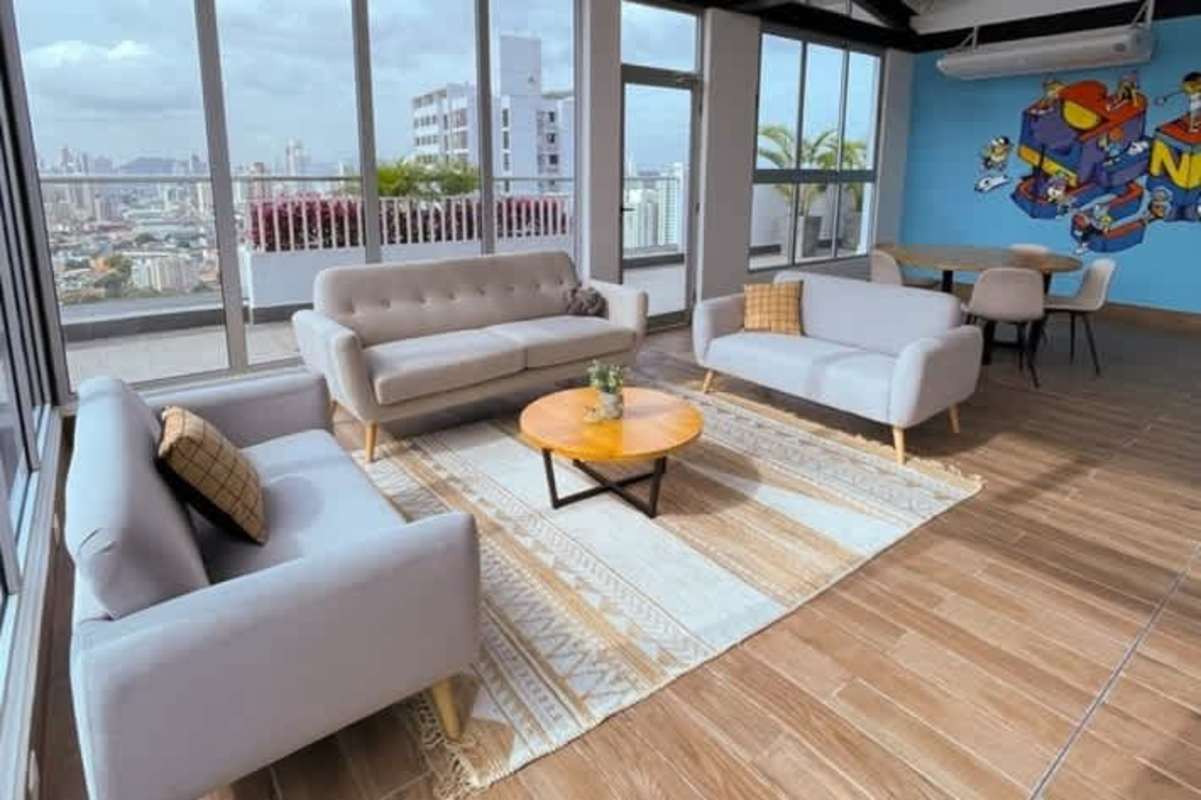 Modern living room with skyline views PH Isabella Towers Carrasquilla Panama City