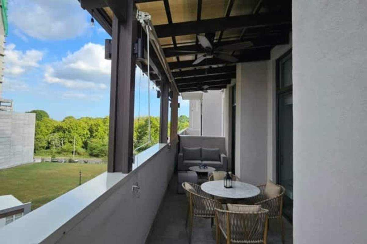 Luxury bedroom with king bed, geometric accent wall and pendant lighting in Santa Maria Panama City