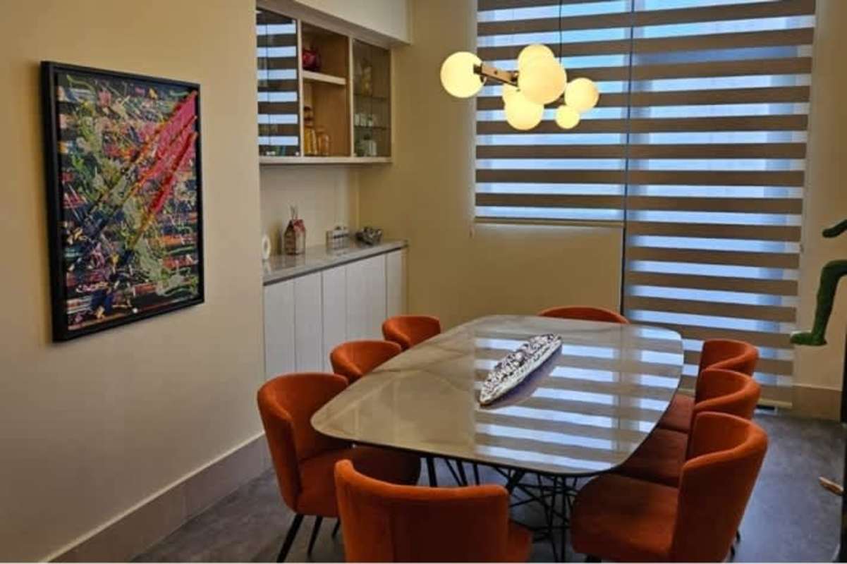 Private covered terrace with vertical garden and outdoor seating in Santa Maria Golf Panama