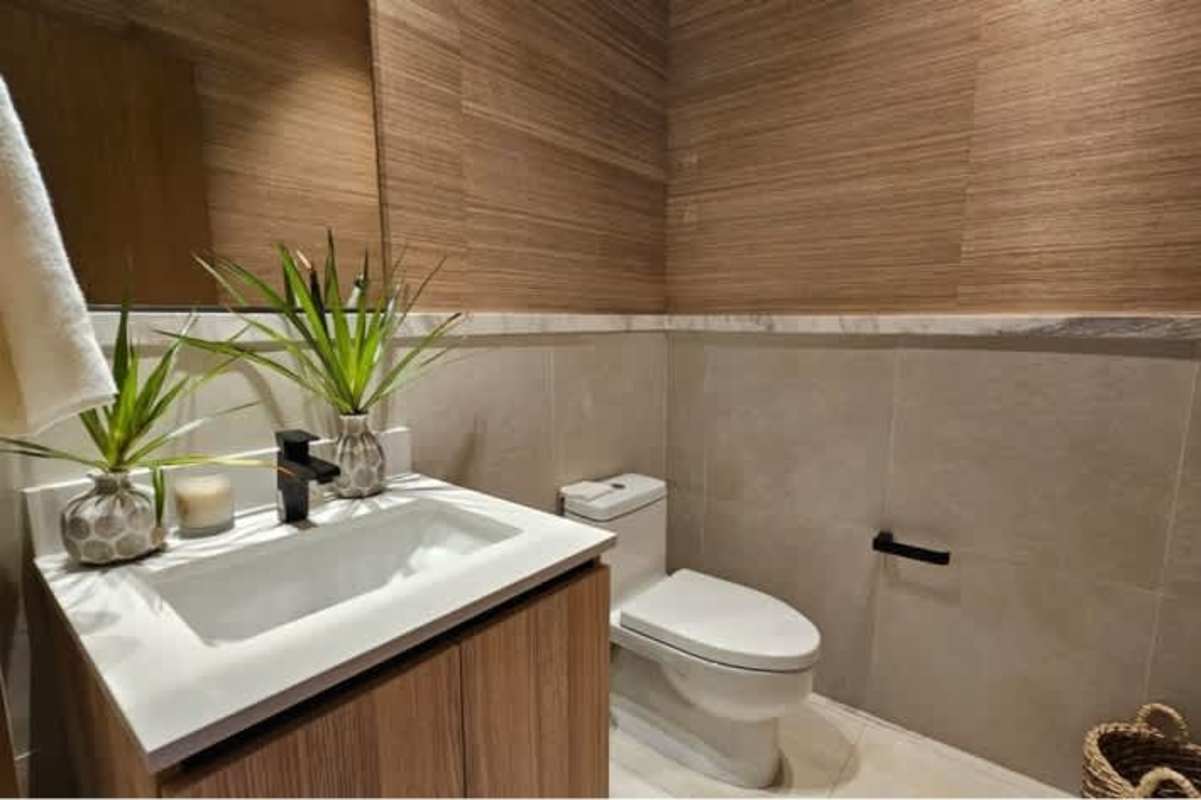 Large master suite with floor-to-ceiling windows view of golf in Santa Maria Panama