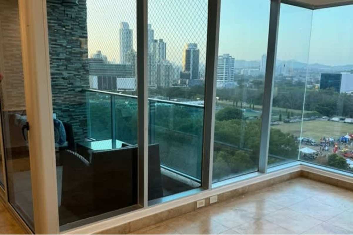 Modern dining area with large window city views PH Seed Costa del Este Panama