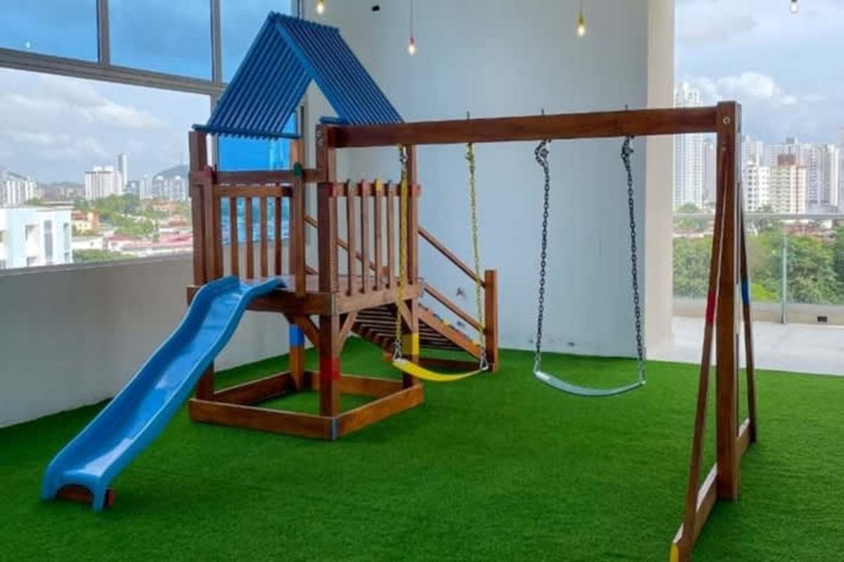 Aerial of rooftop terrace pool multi-story buildings PH Isabella Towers Carrasquilla Panama