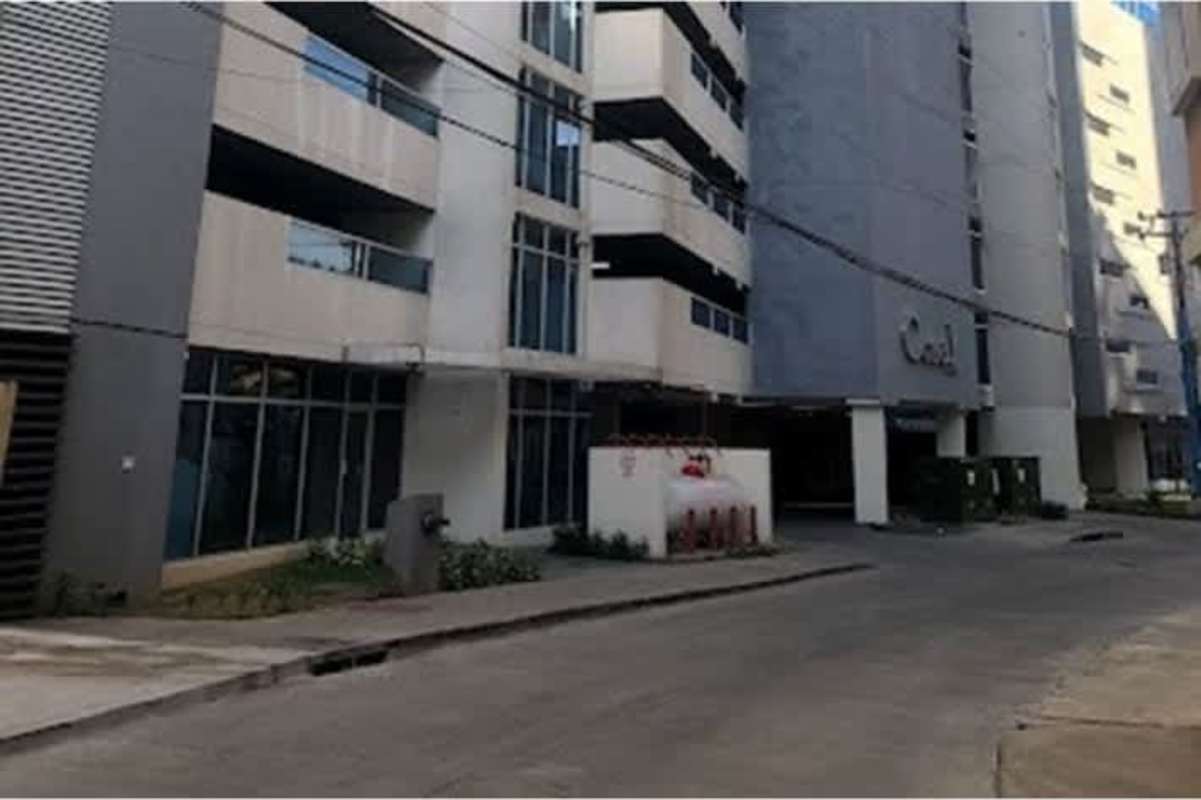 Modern multi-story apartment with balconies and parking Panama City