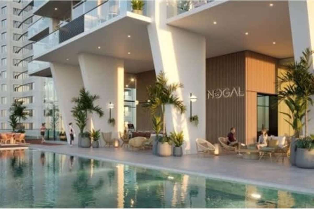 PH Nogal condominium tower in Costa del Este with integrated greenery balconies, glass facade and skyline