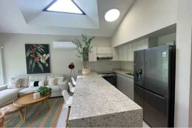 Contemporary open kitchen and living space at Terra Viva Coronado Panama with skylight