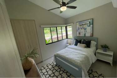 Bedroom with garden views and minimalist décor at Terra Viva Panama