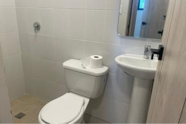 Contemporary bathroom with double sinks and glass shower in Eco friendly Terra Viva Panama