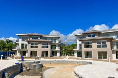 Modern beachfront condominium complex aerial with ocean and tropical landscape Costa Chame Chame Panama