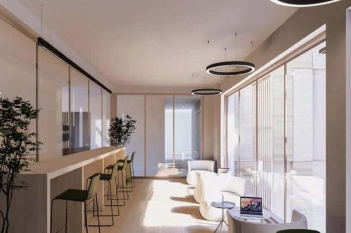 Modern kitchen with marble island open to dining and living at PH The Edge Panama City