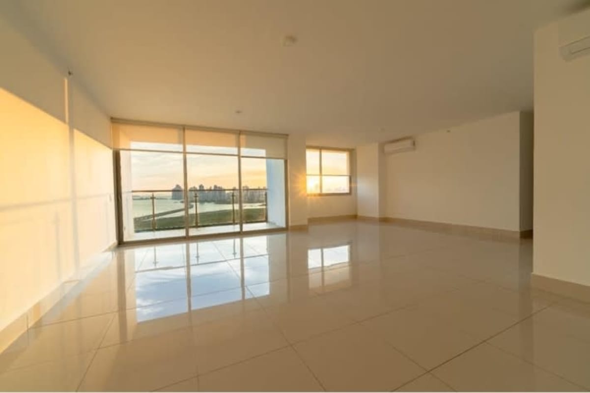 Contemporary lobby with floor-to-ceiling glass, designer chandelier and reception PH Kai