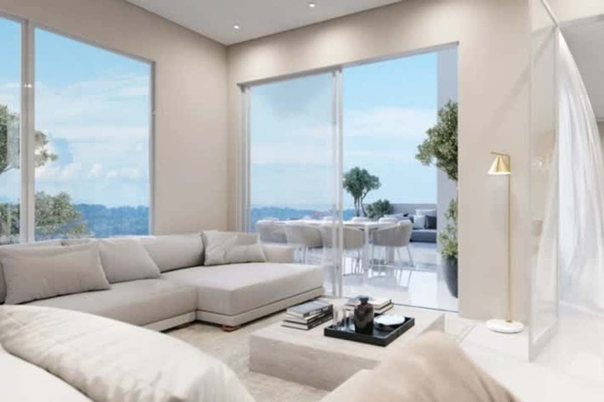 Open living room with city and ocean views at Oceana Santa Maria