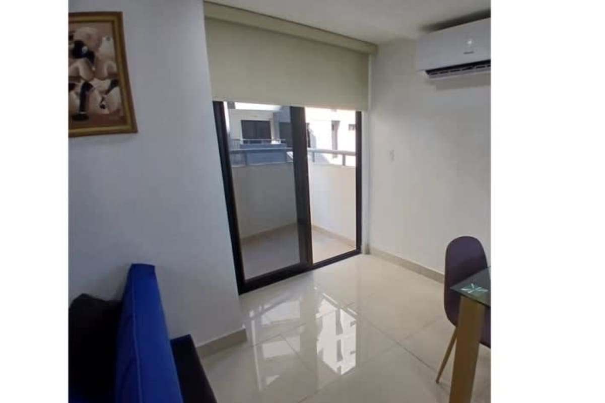 Modern living room with sofa, AC, balcony access in PH Torre Bella Vista Vía España Panama City