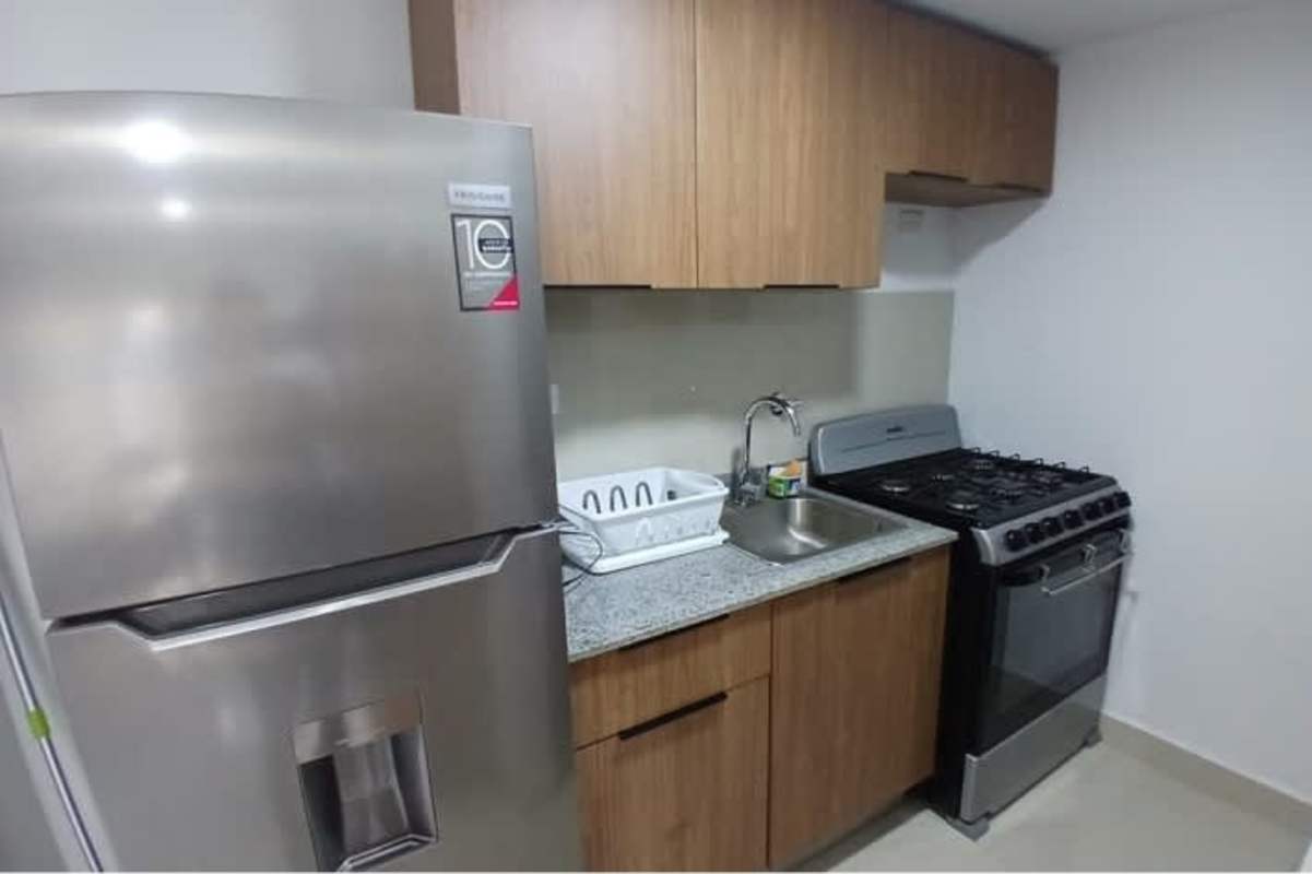 Modern equipped kitchen with granite counters and appliances PH Torre Bella Vista Panama City