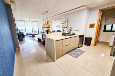 Infinity pools and waterpark with ocean backdrop at Royal Pacific Residences Panama