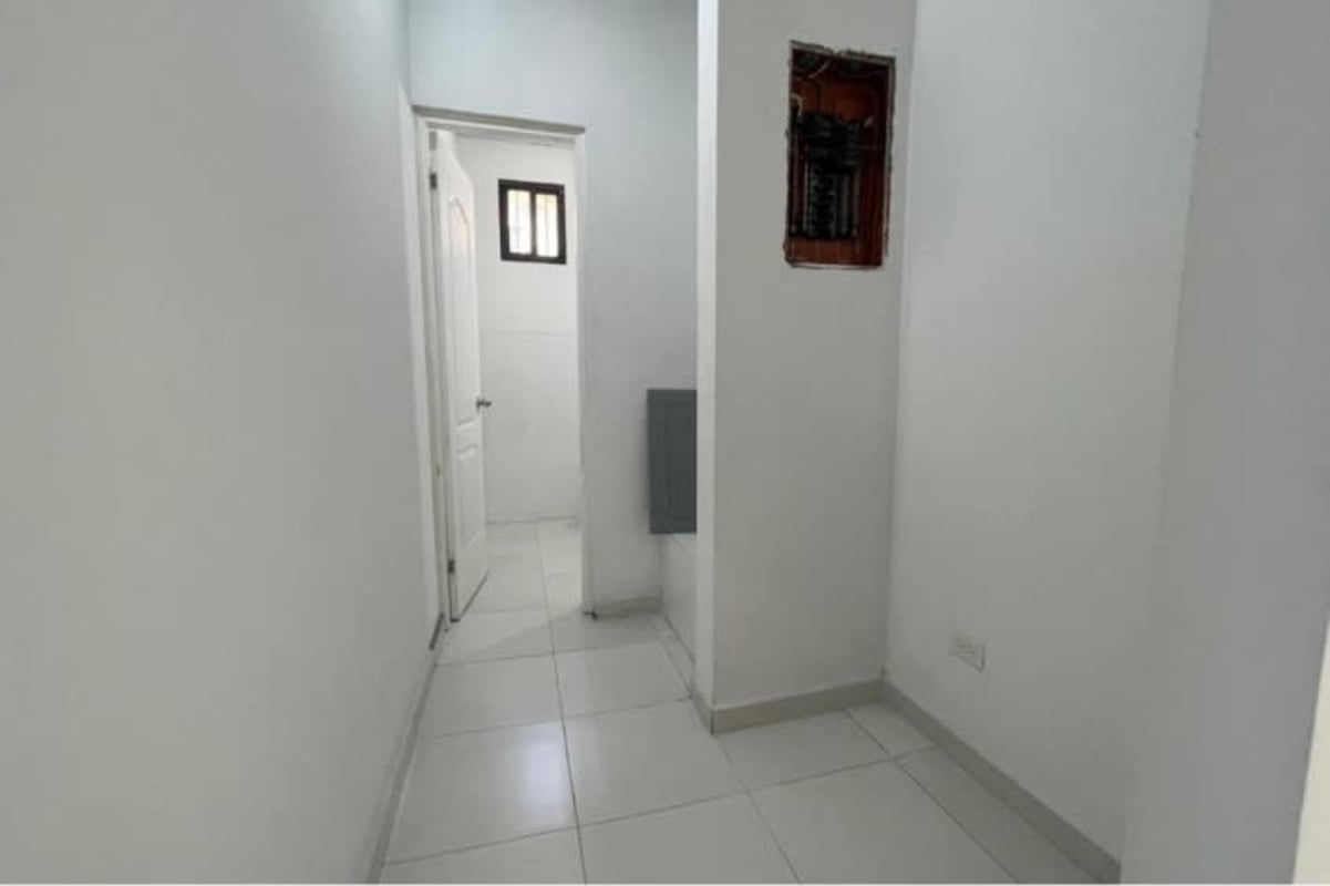 Spacious shop unit interior white tile flooring Parque Lefevre Panama