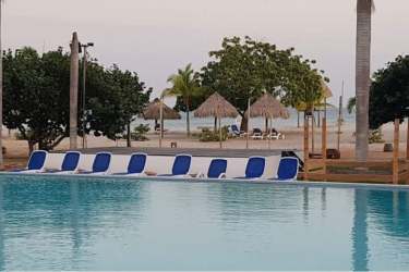 Ocean and pool view from private balcony of Playa Blanca furnished condo Rio Hato Panama