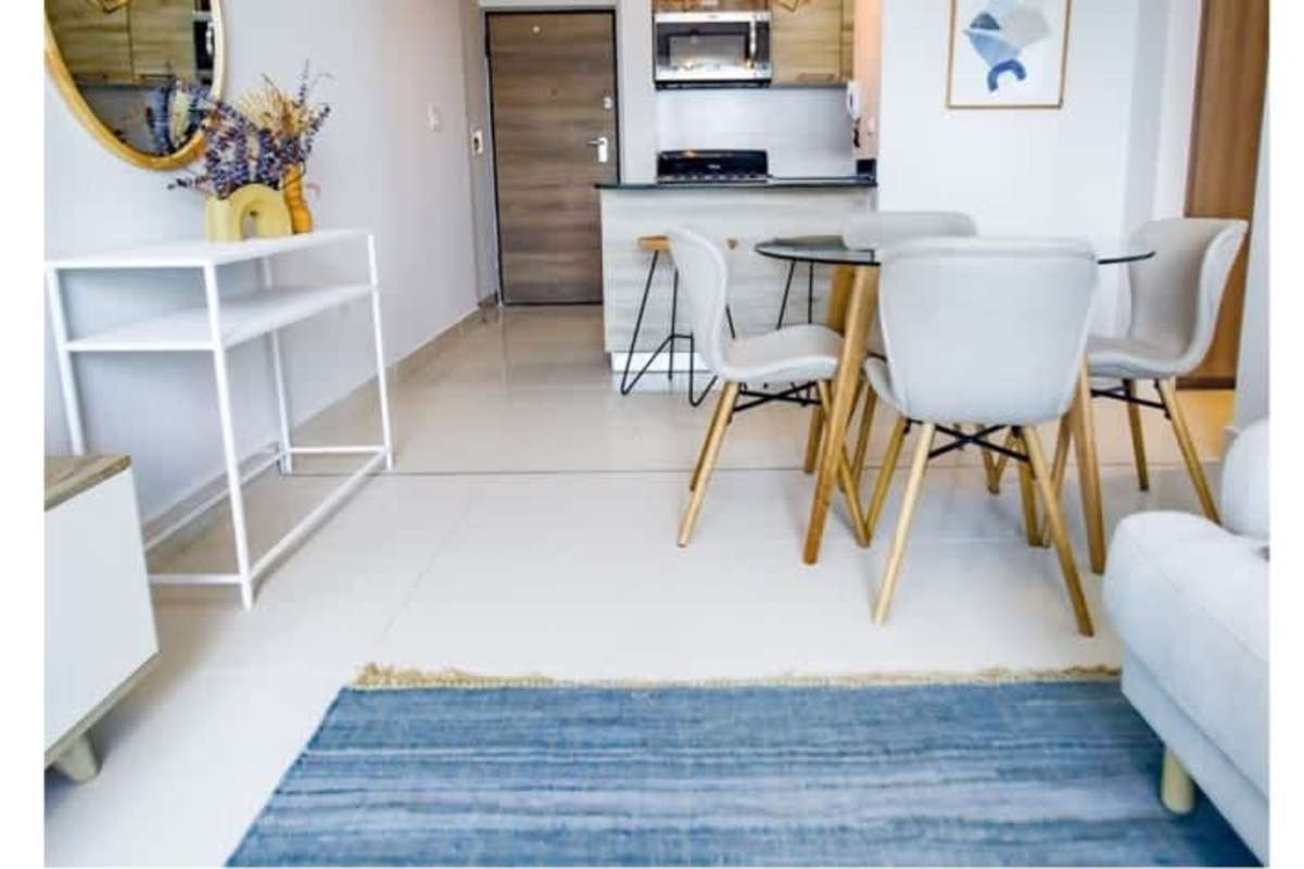 Exterior modern mid-rise building with glass facade PH Alto Río Panama City