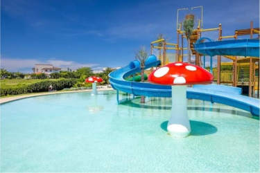 Family-friendly cascade swimming pools with slides and tropical gardens in Costa Esmeralda Panama