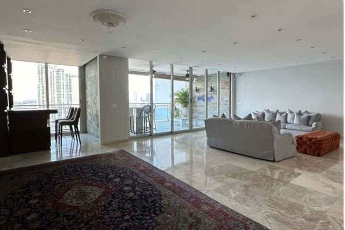 Modern marble bathroom with double vanity, large window and skyline view luxury condo Punta Pacifica Trump Ocean Club Panama